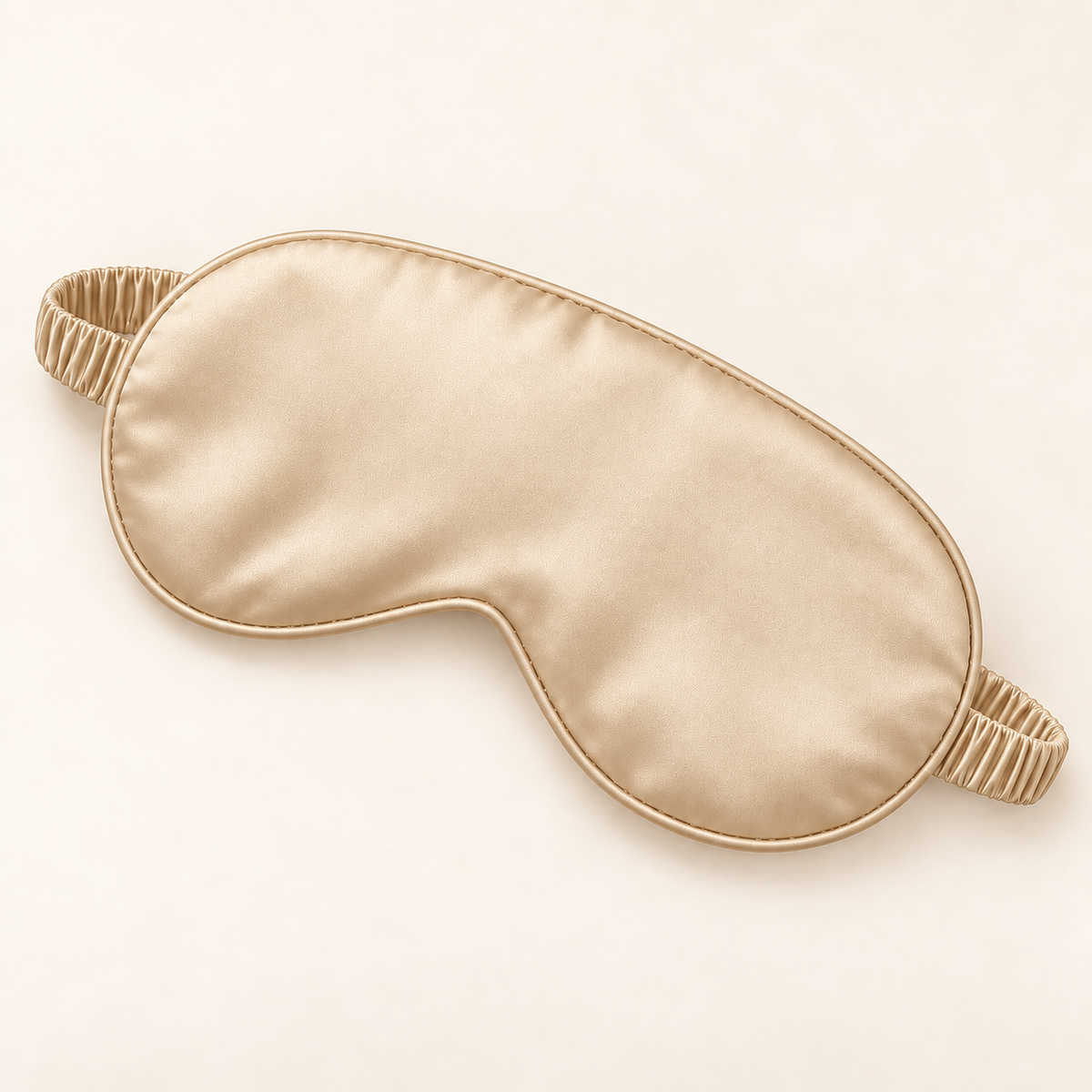 Hushly satin sleep mask in golden on warm ivory