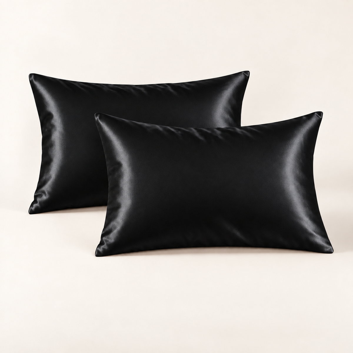 Two Hushly satin pillowcases in black